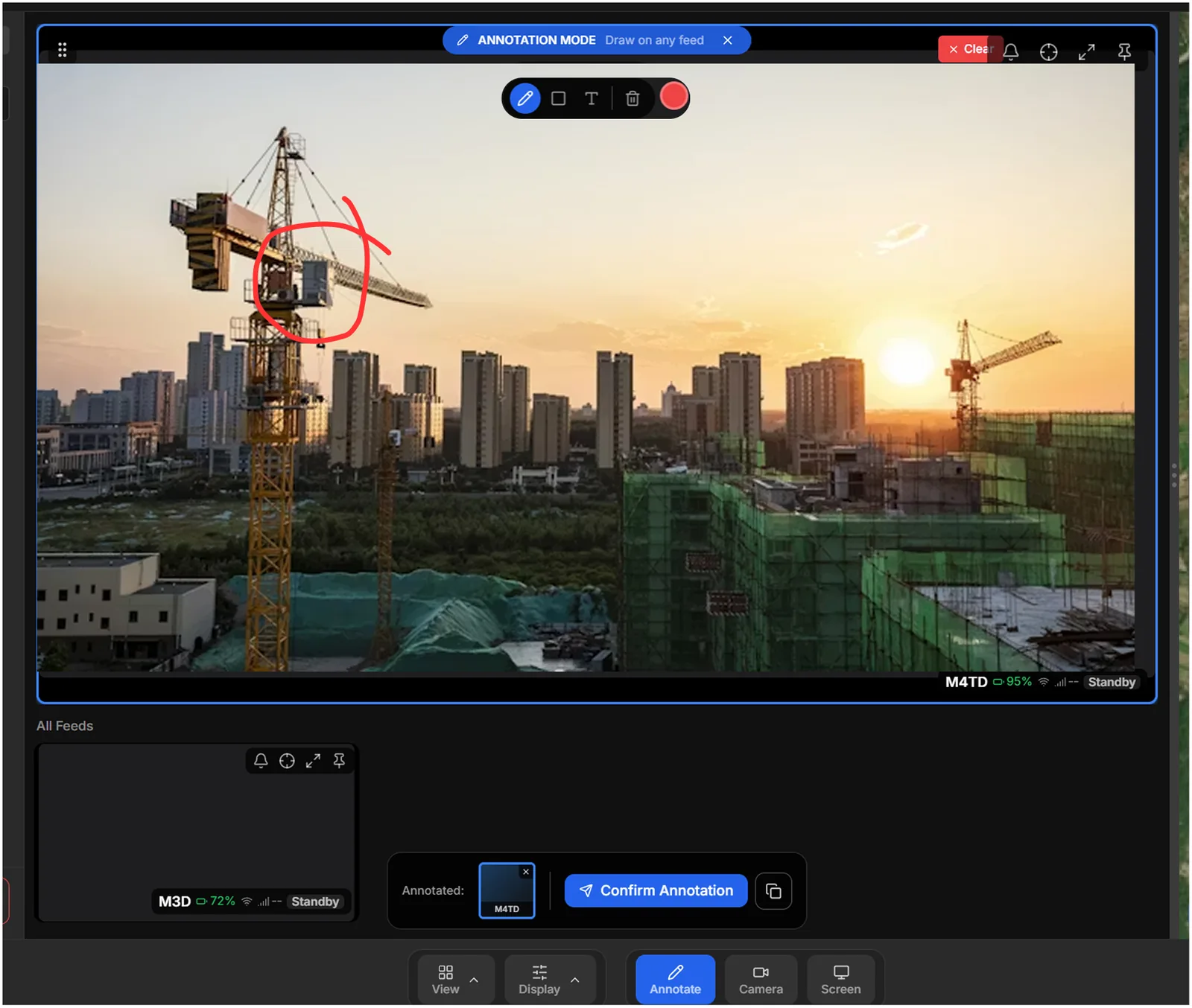 Annotation mode — a collaborator circles a hazard on the live feed.